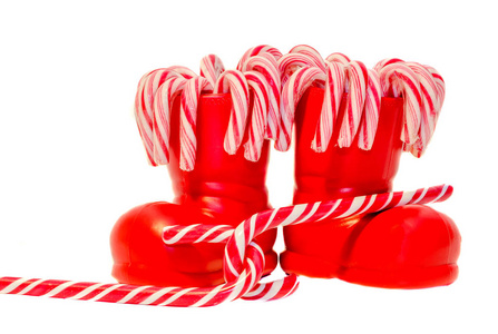 圣诞老人的红靴子，鞋用彩色的甜棒棒糖，糖果