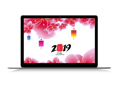 农历新年与樱花在笔记本电脑上绽放。猪的年
