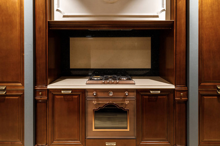 现代厨房内饰用炉灶和烤箱图片