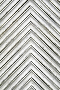 白色木材纹理的图像。具有三角形形状的木质背景图案