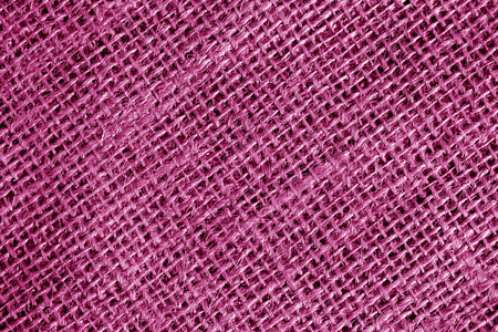 棉布质地以粉红色的颜色。抽象背景和纹理