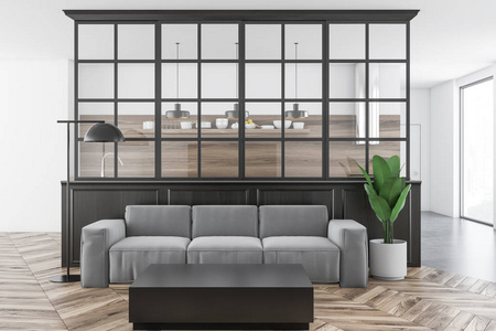 白色和黑色客厅内部有一个木地板和一个长的舒适的沙发站在墙边。3d 渲染模拟