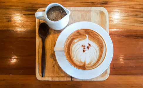 cup cappucino 咖啡木桌上