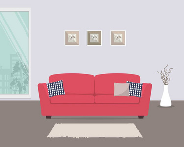 客厅里，红色的沙发和枕头