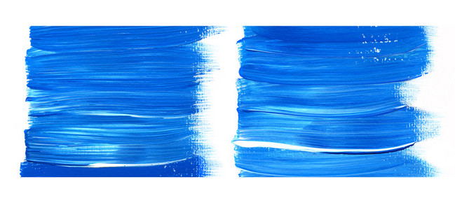 蓝色的丙烯酸涂料染色孤立在白色背景。动态的画笔描边。艺术抽象空间的文本