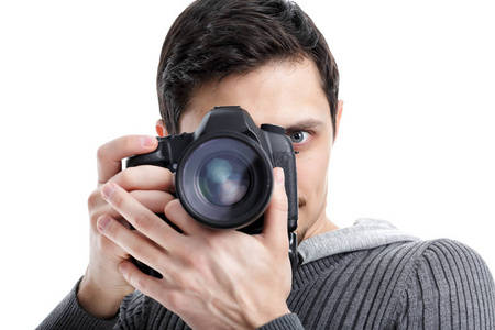 成功的专业摄影师使用单反数码相机上