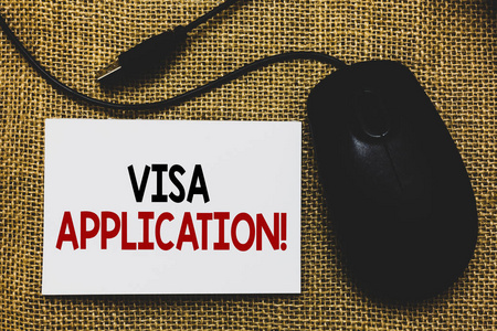 书写笔记, 显示签证申请。商务照片展示形式要求允许旅行或居住在另一个国家传统鼠标旁边的白色页面与书面文字