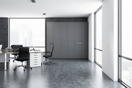 混凝土和白色墙壁办公室内部与混凝土地板, 阁楼窗口和木计算机桌。灰色壁橱。3d 渲染模拟
