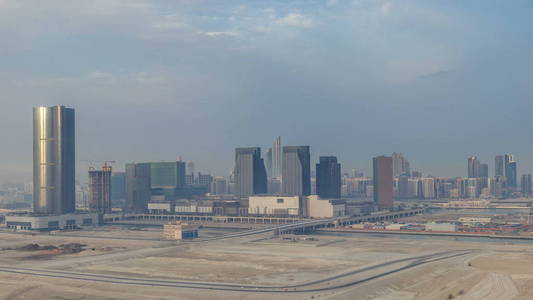 在阿布扎比的 al Reem 和 al Maryah 岛上的摩天大楼 timelapse 从上面。从 Al Reem 岛的空中 