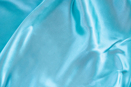 光滑的优雅蓝色丝绸或缎子