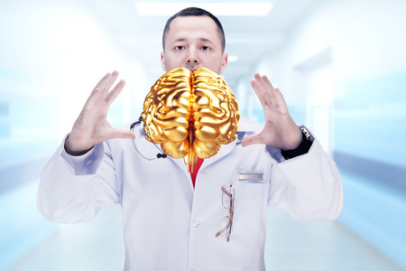医生用听诊器和大脑在医院手上。高分辨率