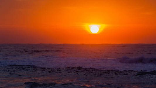 黎明海滩海浪地平线日出景观图片
