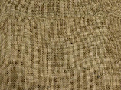 米色织物粗麻布质地有用作为背景