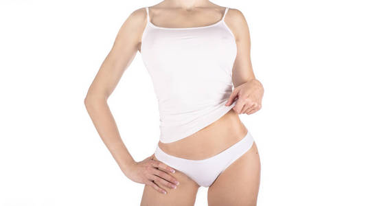 女性身体在白色内衣在它被隔绝在白色。脂肪流失, 吸脂和脂肪去除概念