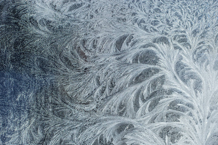 冷若冰霜的玻璃冰背景, 自然美丽的雪花。冰霜冰纹
