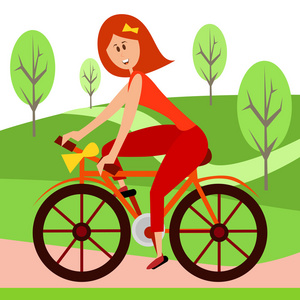 美丽的漂亮女人骑着自行车在公园里