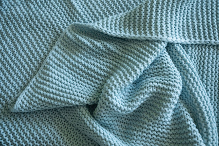 手工蓝色针织羊毛毛毯, 纹理背景
