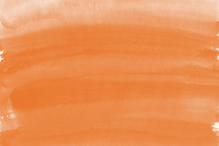 橙色墨水在纸上抽象背景