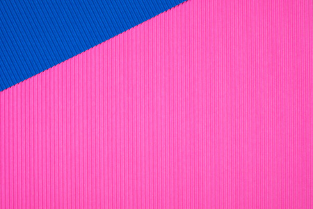 蓝色和粉红色波纹纸纹理, 用于背景。具有复制空间的生动色彩, 用于添加文本或对象