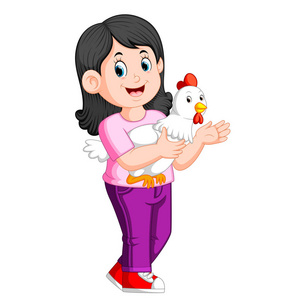 一个美丽的女孩抱着一只公鸡