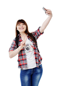 幸福微笑的女人，在智能手机上的自拍照合影