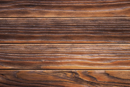在温暖的褐色色调的旧木材纹理