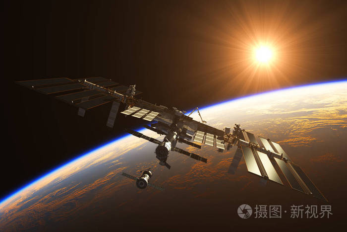 国际空间站为背景,升起的太阳