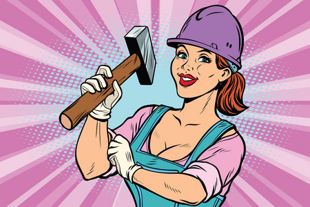 建筑工人用铁锤。女人专业