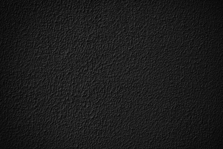 黑色的颗粒状石膏墙纹理