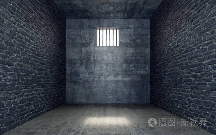 用光透过铁栅栏的窗户照进来的监狱牢房