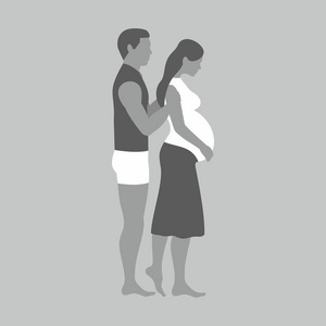 灰色背景下的夫妇男人和怀孕妇女