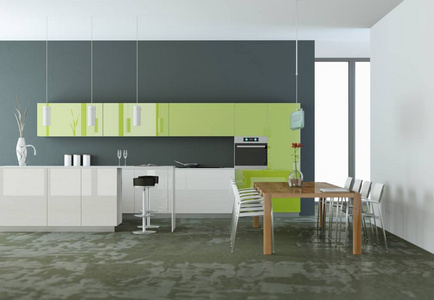 绿色现代厨房在有灰色墙壁的房间里