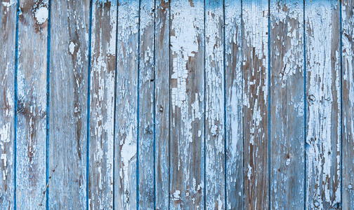 旧漆纹理老式木材背景与剥离油漆。被绘的被风化的平原蓝色和白色质朴的木板后面地面可以是水平的或垂直的