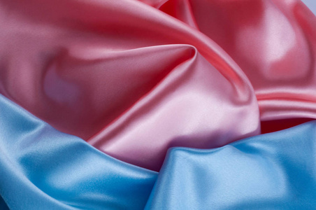 抽象丝绸豪华背景, 一块布, 浅粉色和浅蓝色布料纹理
