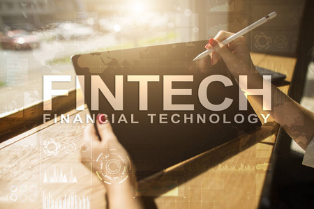 Fintech虚拟屏幕上的财务技术文本。商业互联网和技术概念