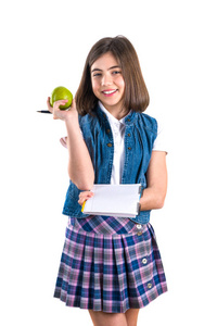女学生与笔记本和苹果在白色背景