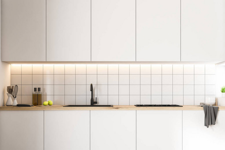 白色厨房台面与内置的电器站在厨房与白色瓷砖墙。室内设计理念。3d 渲染模拟