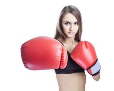 目的概念 拳击手套中年轻运动女性的肖像