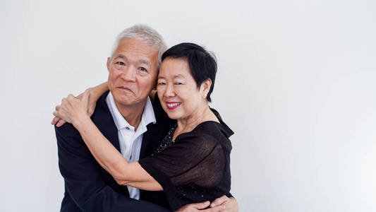 幸福的亚洲高级夫妇。成功的商业和生活，团结在一起