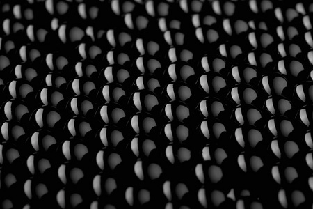 黑鱼子酱。宏的照片。黑色的球体。抽象背景