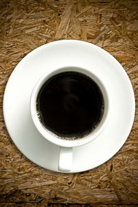 grunge 木桌上的咖啡杯子