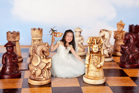 在棋枰上的小女孩图片