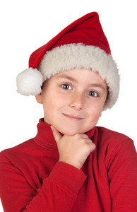 圣诞老人帽子思维的可爱男孩