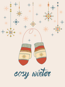 舒适的冬天卡与手套和部落风格淡粉色色调背景上的雪花。季节设计