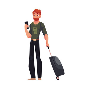 年轻男子带行李箱和电话在牛仔裤 t 恤