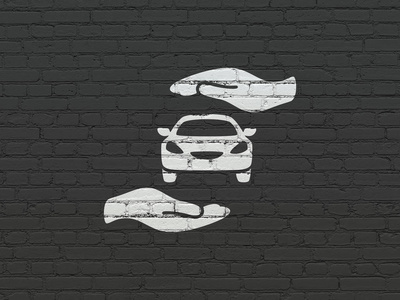 保险的概念  在背景墙上的车和棕榈