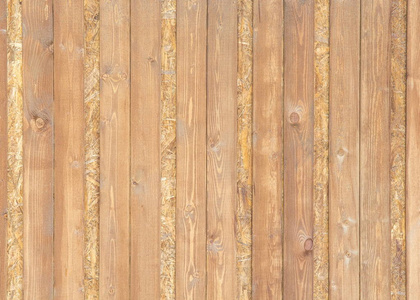 纹理图案背景。 木制板条。 一种薄而窄的木头，尤指一系列相互重叠或配合的木材中的一种，如栅栏或威尼斯盲人。