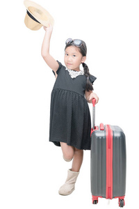 可爱的女孩的旅客以分离的手提箱