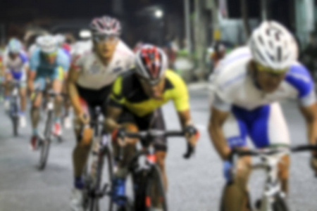 模糊骑自行车亚锦赛赛程为背景