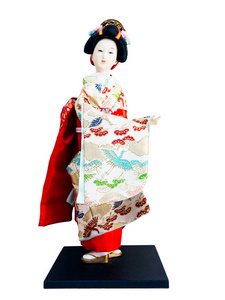 白色背景上孤立的日本艺妓玩具